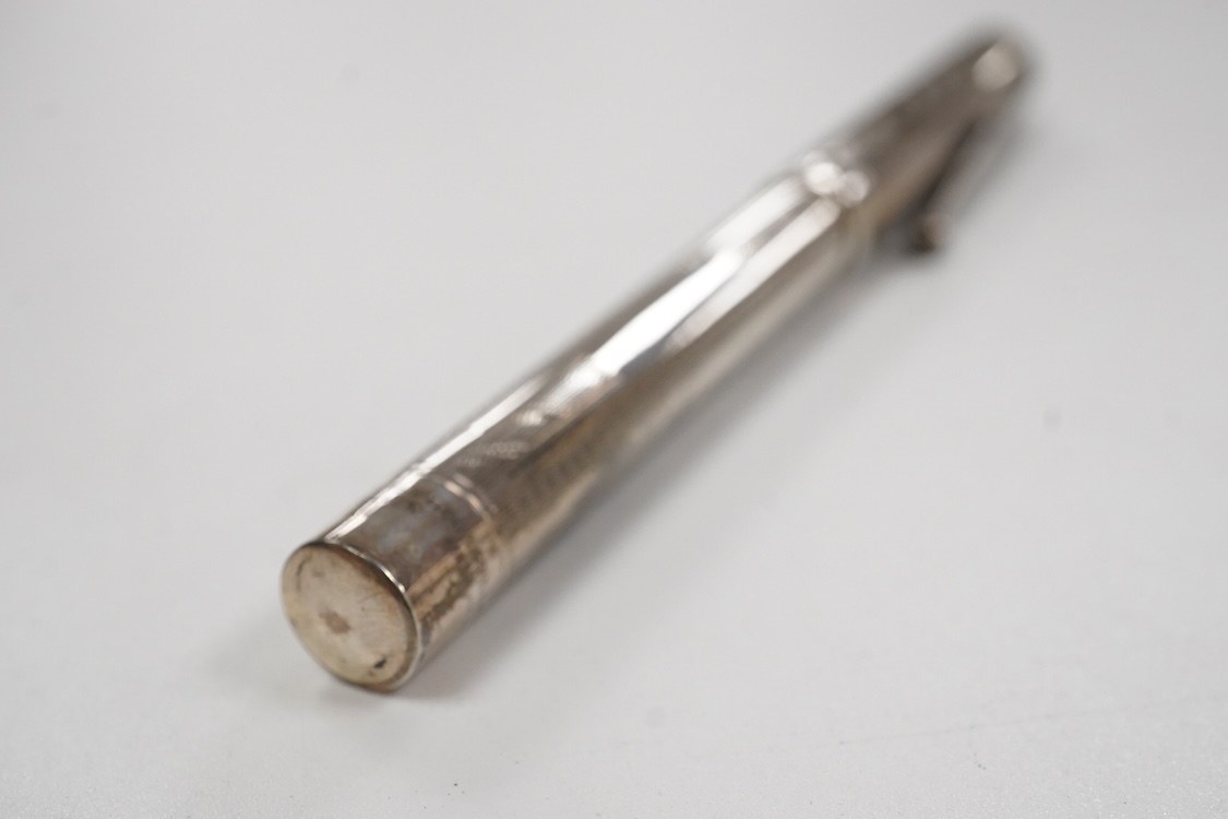 A Mabie Todd & Co. Swan Sterling silver lever filler, Made in USA with 14ct. flexible nib